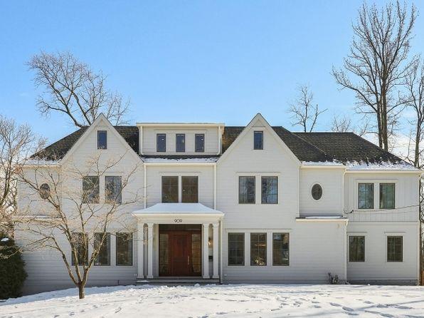 Luxury Colonial home on the North Side of Westfield NJ with white exterior, symmetrical design, and grand front entrance